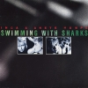 SWIMMING WITH SHARKS